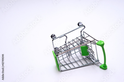 Toy shopping cart isolated on white backgound