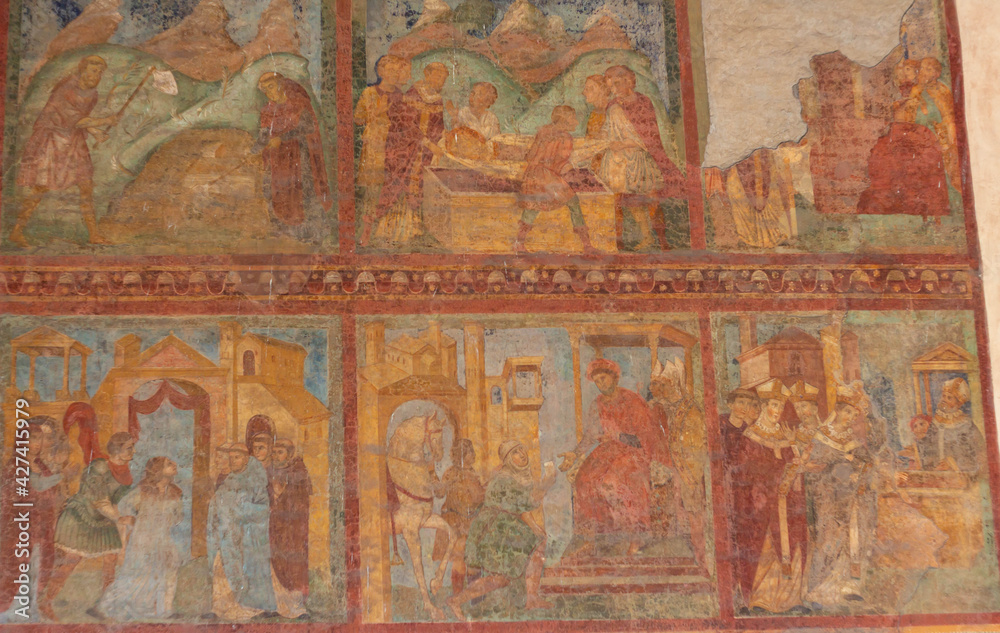 The original frescoes of St. Lawrence and St. Stephen at San Lorenzo outside the walls(RM) , Italy , depict scenes from the lives both being martyred,young deacons.