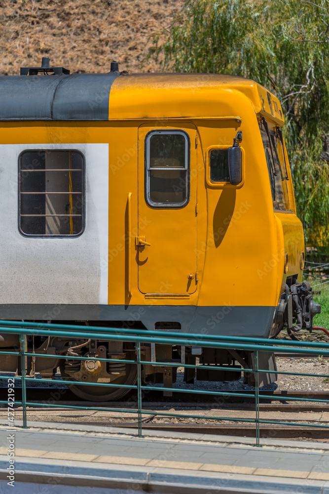 Front view of a regional train, typical of the Portuguese train network, at the train station in the city of Peso da Regua