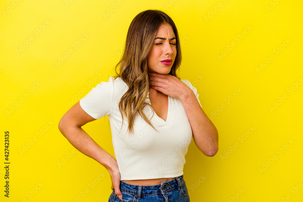 Young caucasian woman isolated on yellow background Young caucasian woman isolated on yellow background