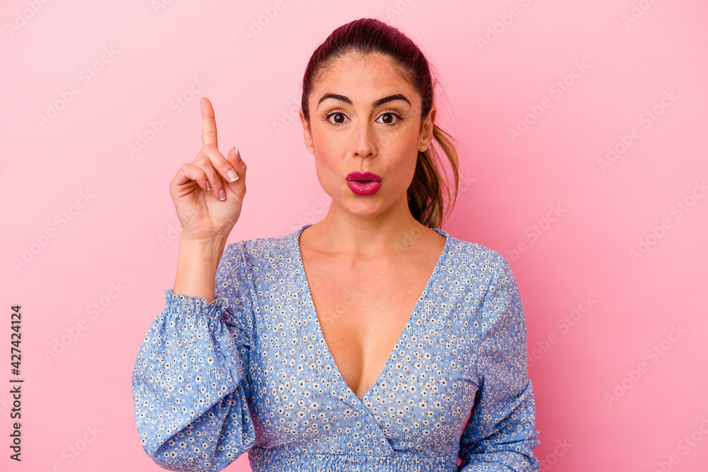 Young caucasian woman isolated on pink background Young caucasian woman isolated on pink background