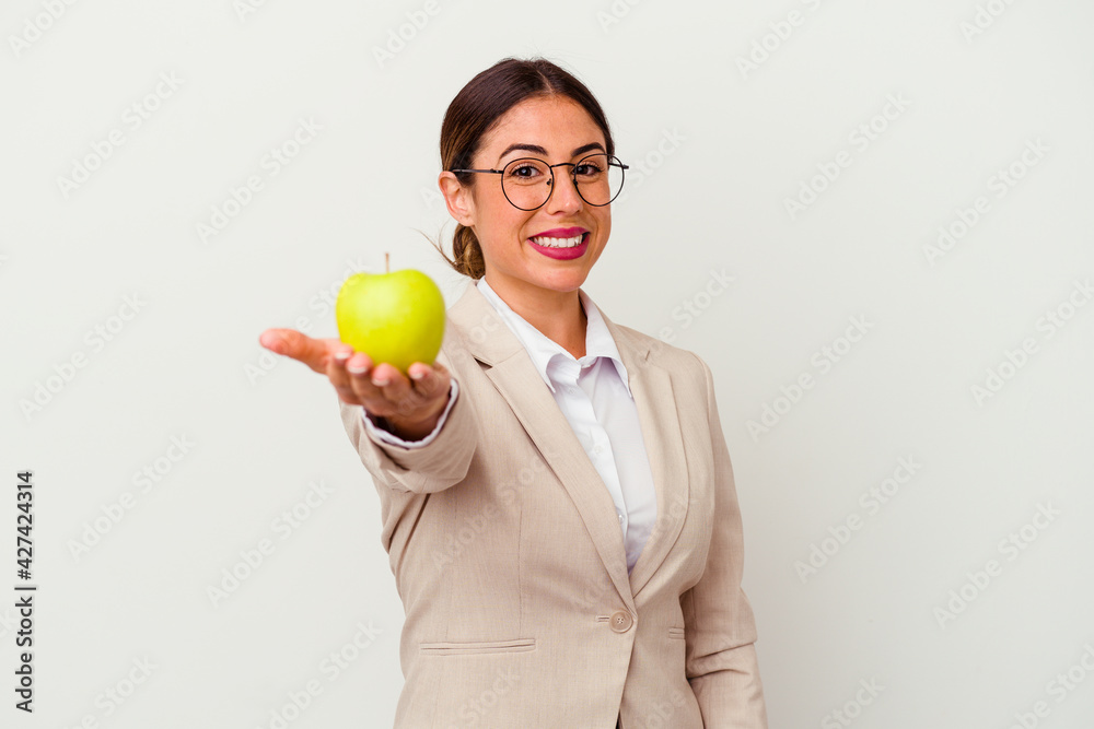 Young caucasian business woman eating an apple isolated Young caucasian business woman eating an apple isolated