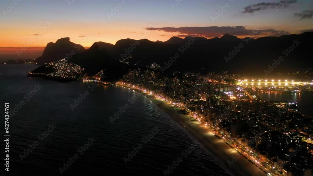 Sunset in Ipanema and Leblon beach, Rio de Janeiro illuminated city, Brazil.Sunset in Ipanema and Leblon beach, Rio de Janeiro city.Sunset in Ipanema and Leblon beach, Rio de Janeiro illuminated city. Sunset in Ipanema and Leblon beach, Rio de Janeiro illuminated city, Brazil.Sunset in Ipanema and Leblon beach, Rio de Janeiro city.Sunset in Ipanema and Leblon beach, Rio de Janeiro illuminated city.