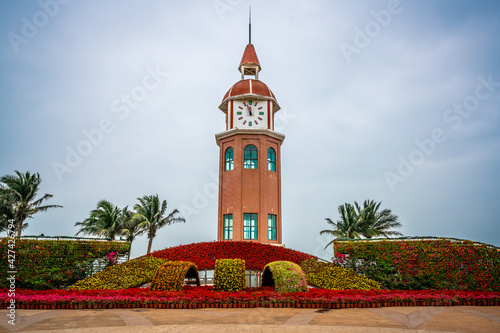 Front view of the Guanhaitai clock tower Haikou Hainan China photo