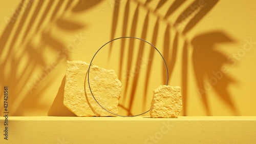 3d render, abstract summer yellow background with tropical leaf shadow and bright sunlight. Minimal showcase scene with cobblestones and silver ring for organic cosmetic product presentation photo