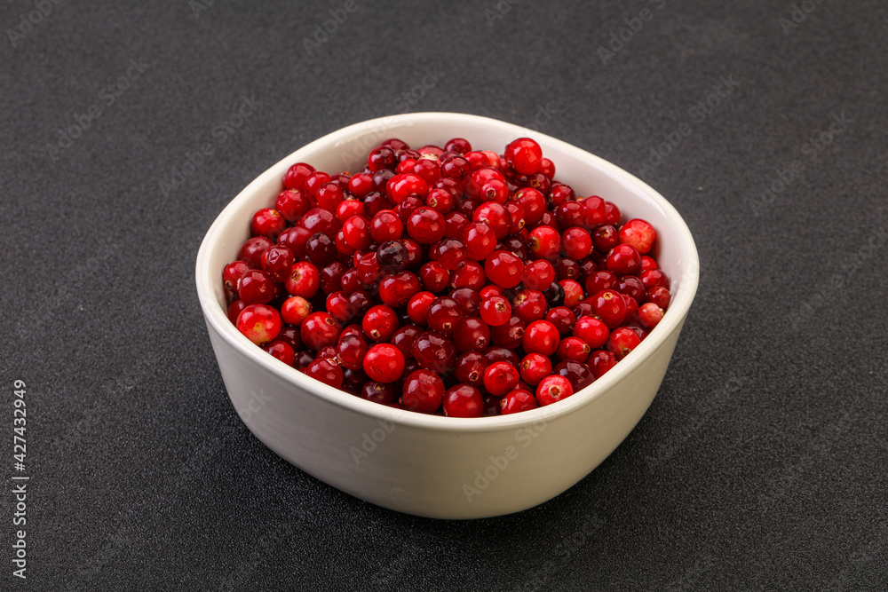 Sweet and tasty cranberry in the bowl Sweet and tasty cranberry in the bowl