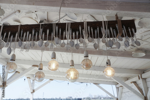 Beach bar. Vintage light bulbs in a beach bar. © samy