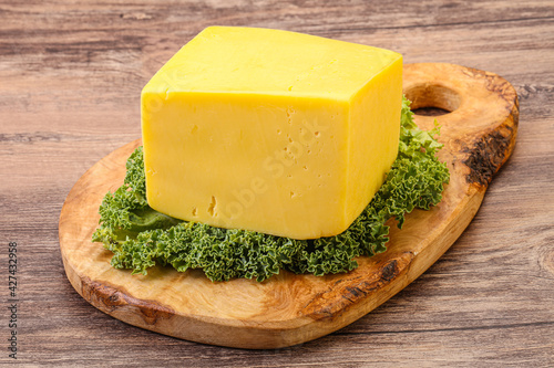 Yellow tilsiter cheese dairy product photo