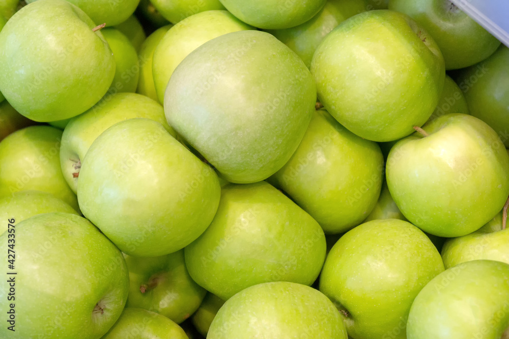 green apples scattering on the shop window green apples scattering on the shop window