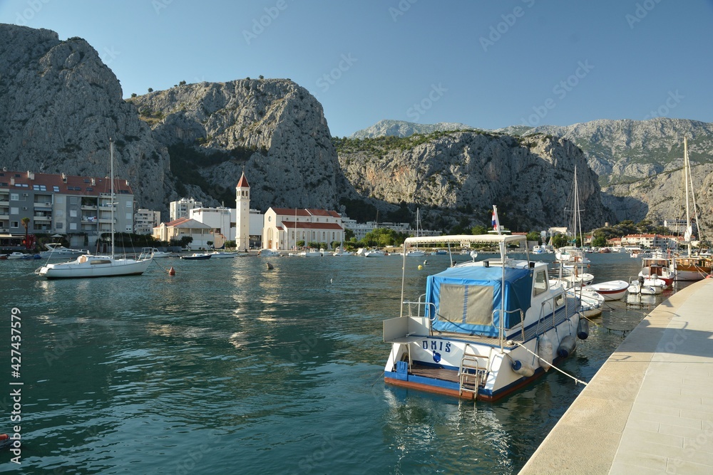 Omis port in Split-Dalmatia County in Dalmatia, Croatia, with boats and ships