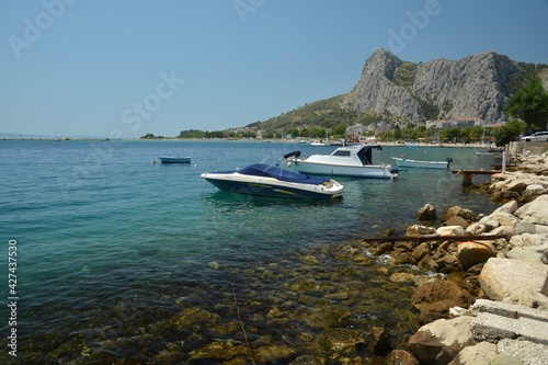 Fototapeta Naklejka Na Ścianę i Meble -  Omis port in Split-Dalmatia County in Dalmatia, Croatia, with boats and ships