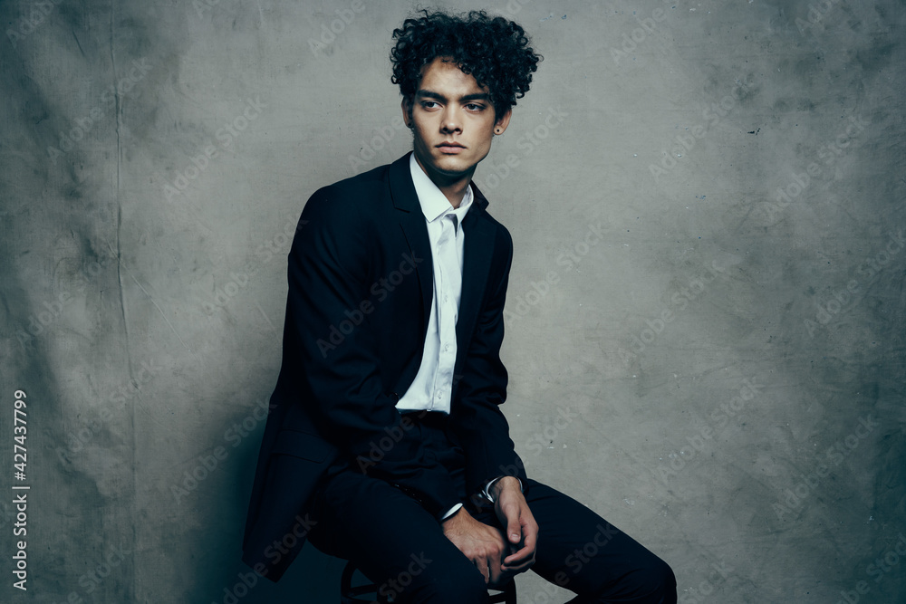 man in black blazer curly hair fashion modern style official man in black blazer curly hair fashion modern style official