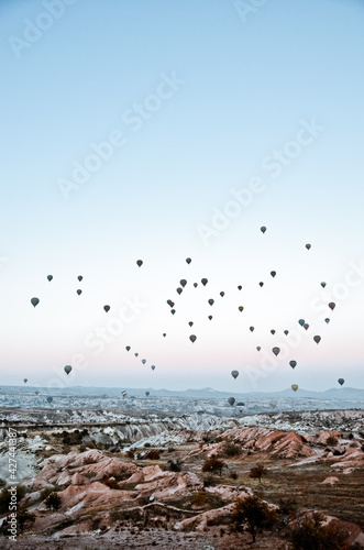 TURKEY  CAPPADOCIA  GOREME   Aerial scenic view of hot air balloons flying over valleys of G  reme National Park