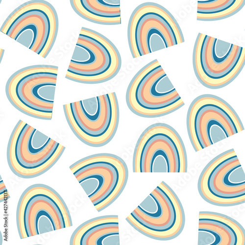 Seamless pattern from abstract colorful rainbow in the Scandinavian style. Isolated minimalistic rainbow on a white background. For the design of the children's room, poster, print on fabric.