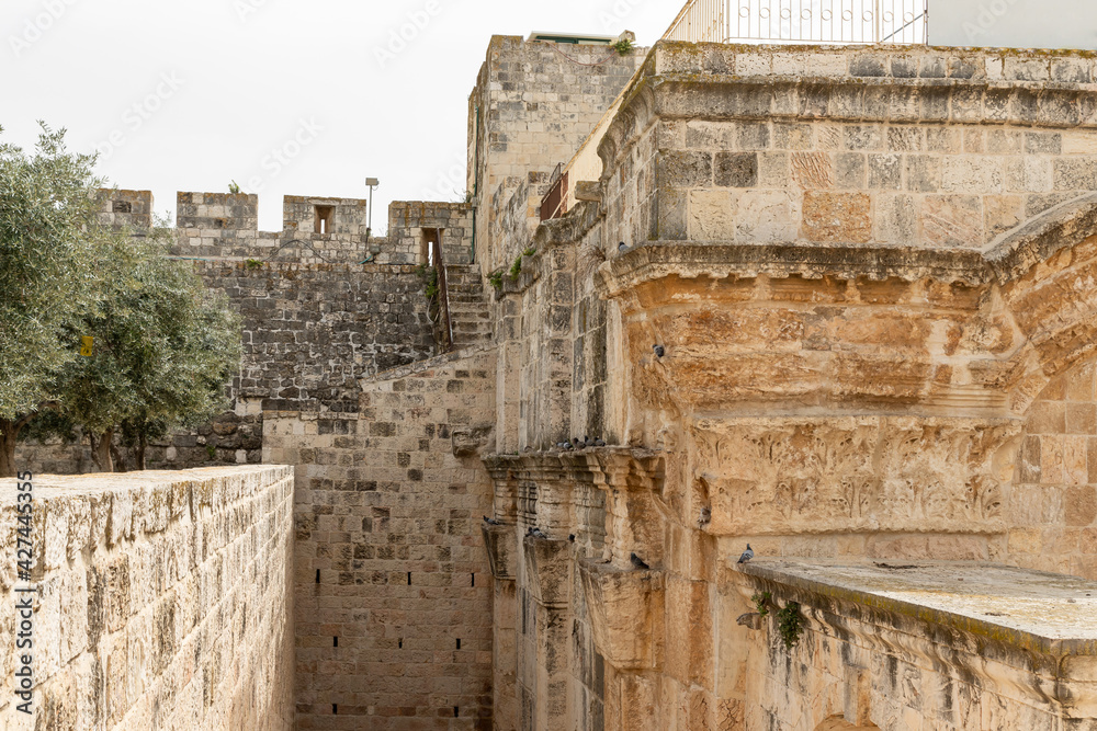 The wall  encircling the Temple Mount near the closed Golden Gate - Gate of Mercy on the Temple Mount in the Old Town of Jerusalem in Israel