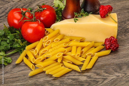 Raw penne rigate for cooking