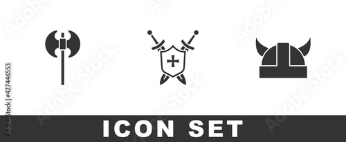 Set Medieval axe, shield with swords and Viking in horned helmet icon. Vector