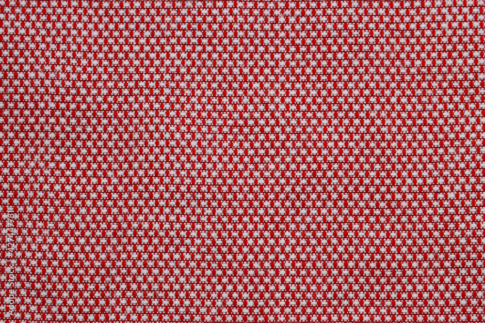 Close-up of the red and white textile texture, background and wallpaper. Close-up of the red and white textile texture, background and wallpaper.