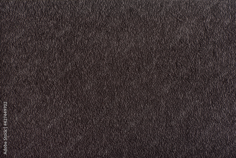 Fototapeta premium Gray homogeneous background. Textile. Surface of the fabric. Gray rough background