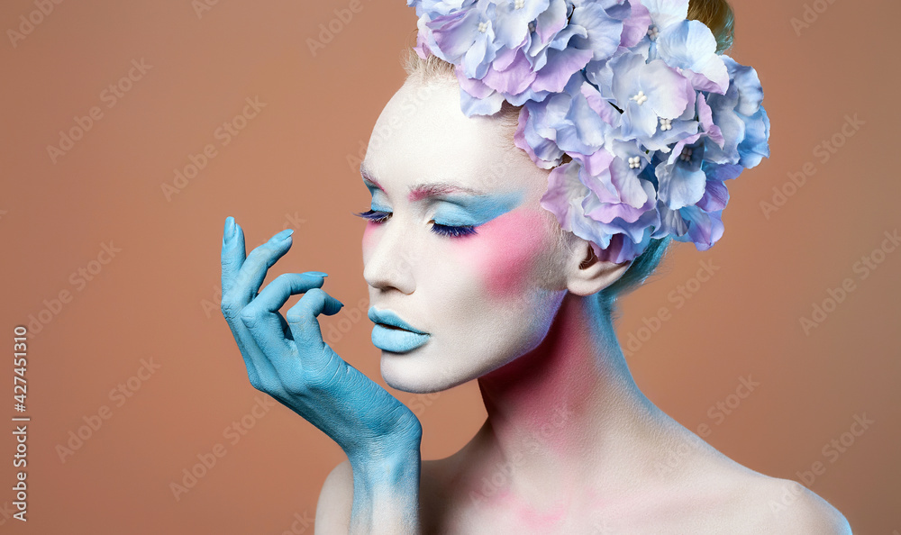 colorful beauty girl with flowers and body art