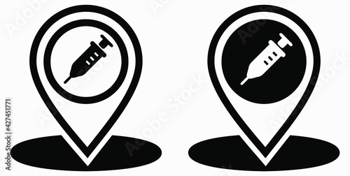 Syringe and location icon. Vaccination sign. The location of the hospital. Vector icon.