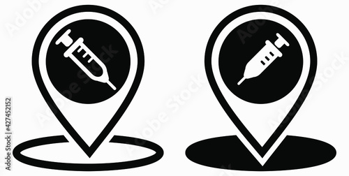 Syringe and location icon. Vaccination sign. The location of the hospital. Vector icon.