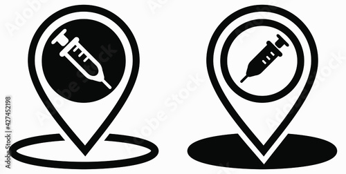 Syringe and location icon. Vaccination sign. The location of the hospital. Vector icon.