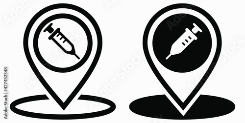 Syringe and location icon. Vaccination sign. The location of the hospital. Vector icon.