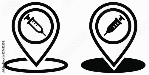 Syringe and location icon. Vaccination sign. The location of the hospital. Vector icon.