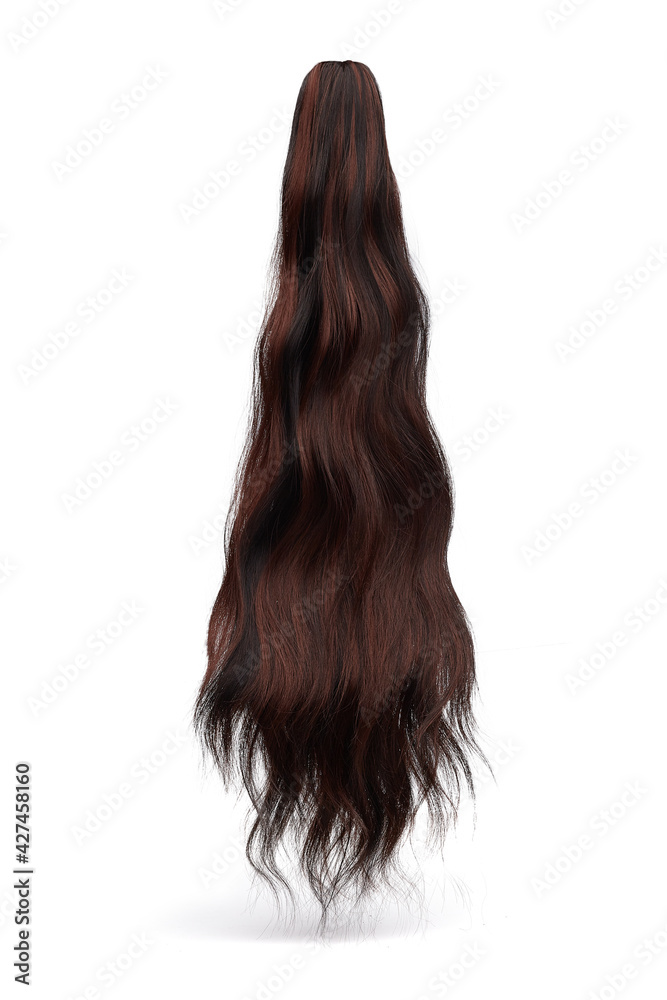 Fototapeta premium Detail shot of brown wavy ponytail for hair extension. Natural looking false hairpiece is isolated on the white background. 