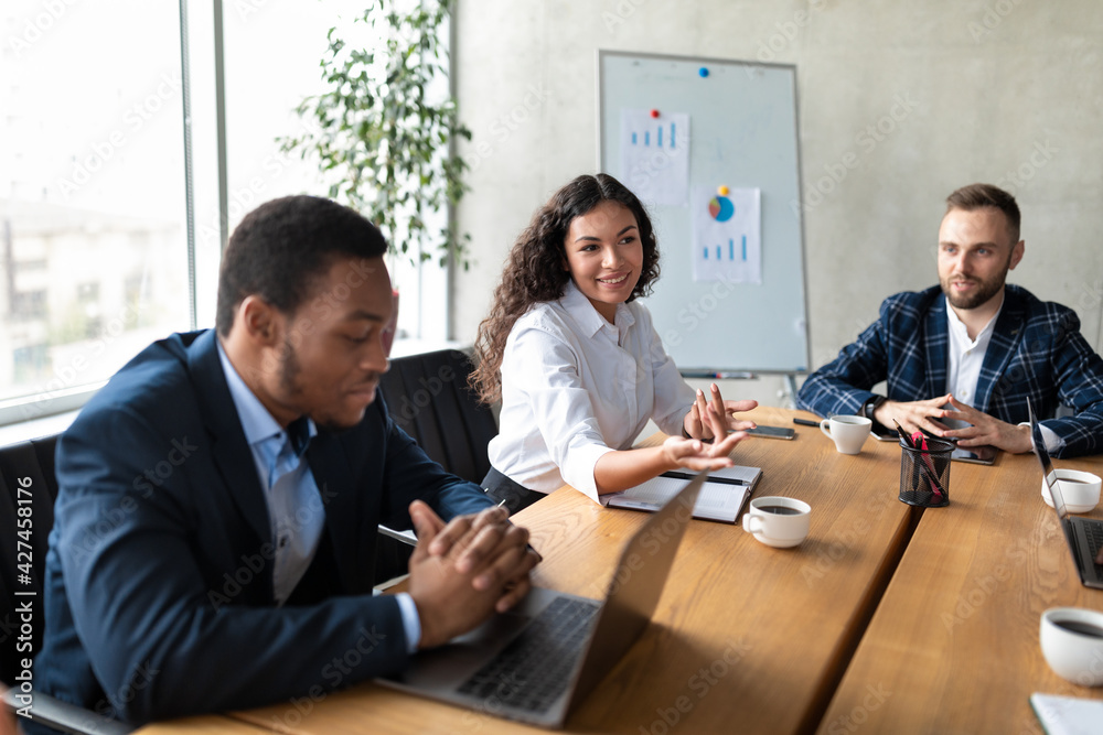 Business People Having Corporate Meeting, Talking About Projects In Office Business People Having Corporate Meeting, Talking About Projects In Office