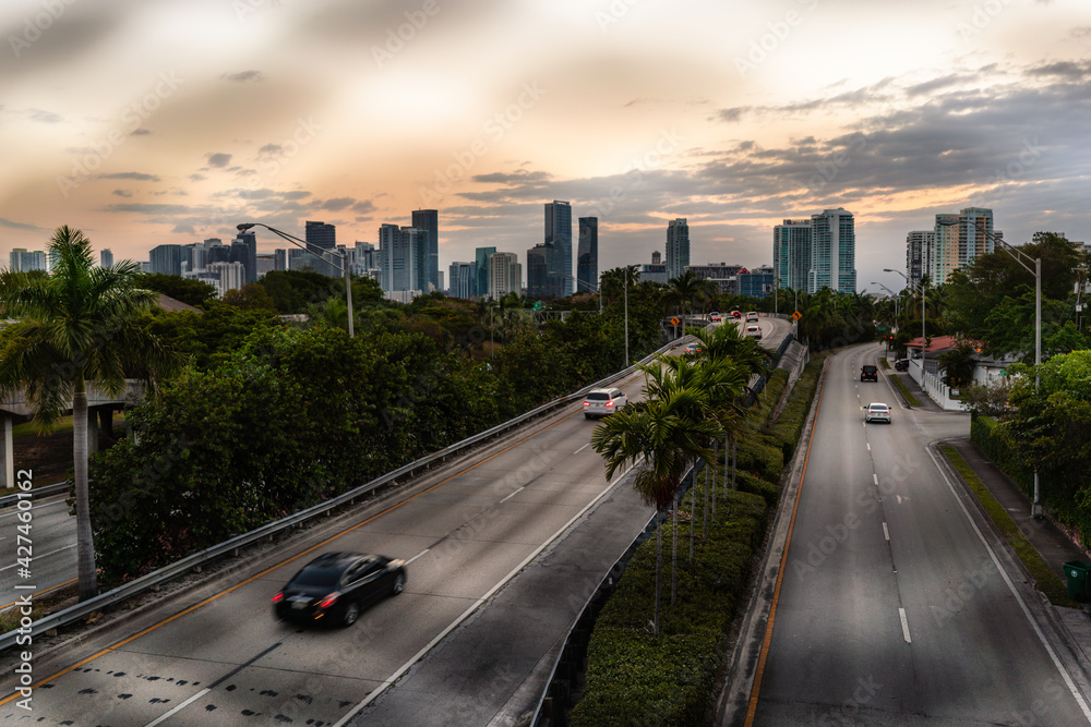 traffic in the city Miami Florida horizon buildings 