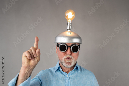 Senior businessman have a bright idea photo