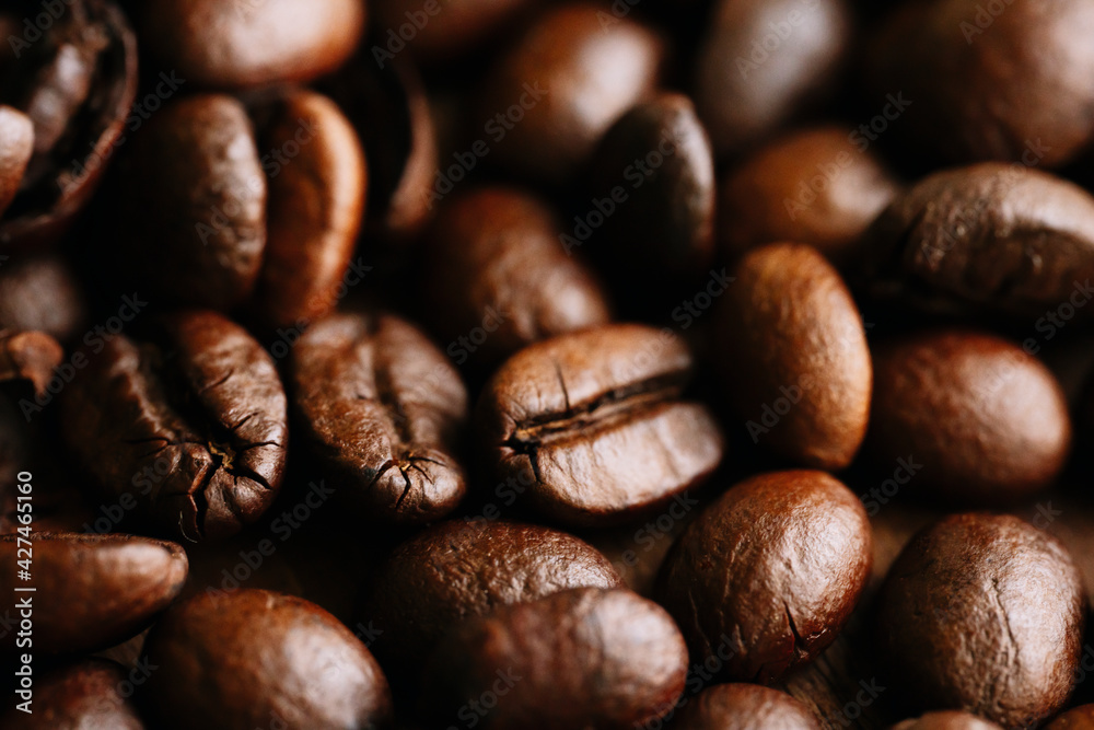 Naklejka premium Macro view of a lot of coffee beans