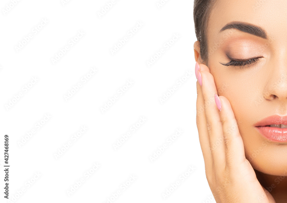 Face of a beautiful oriental brunette girl. Close-up portrait of young and attractive woman with brown eyes. Face of a beautiful oriental brunette girl. Close-up portrait of young and attractive woman with brown eyes.