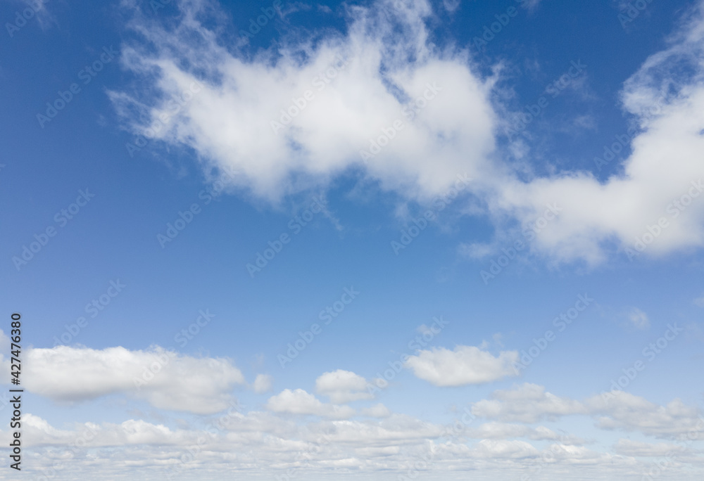 view of white clouds in blue sky view of white clouds in blue sky