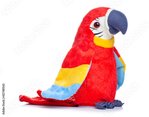Soft toy parrot on white background isolation