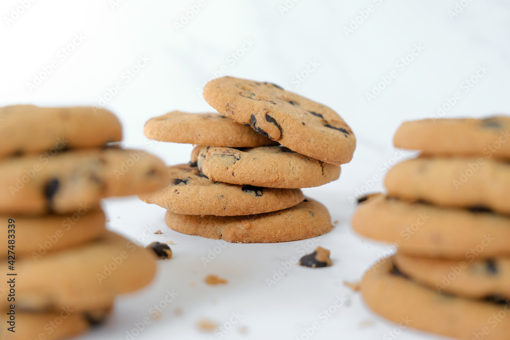 Set of chocolate chip cookies on marble background. Snack or treat for tea or coffee. Set of chocolate chip cookies on marble background. Snack or treat for tea or coffee.