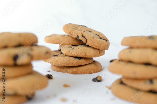 Set of chocolate chip cookies on marble background. Snack or treat for tea or coffee.