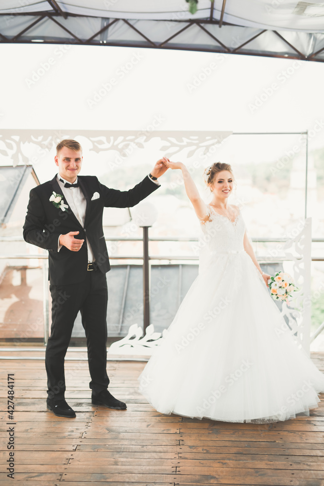 Beautiful bride and groom spinning with perfect dress Beautiful bride and groom spinning with perfect dress