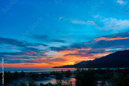 Colorful sunset on an island in the tropics