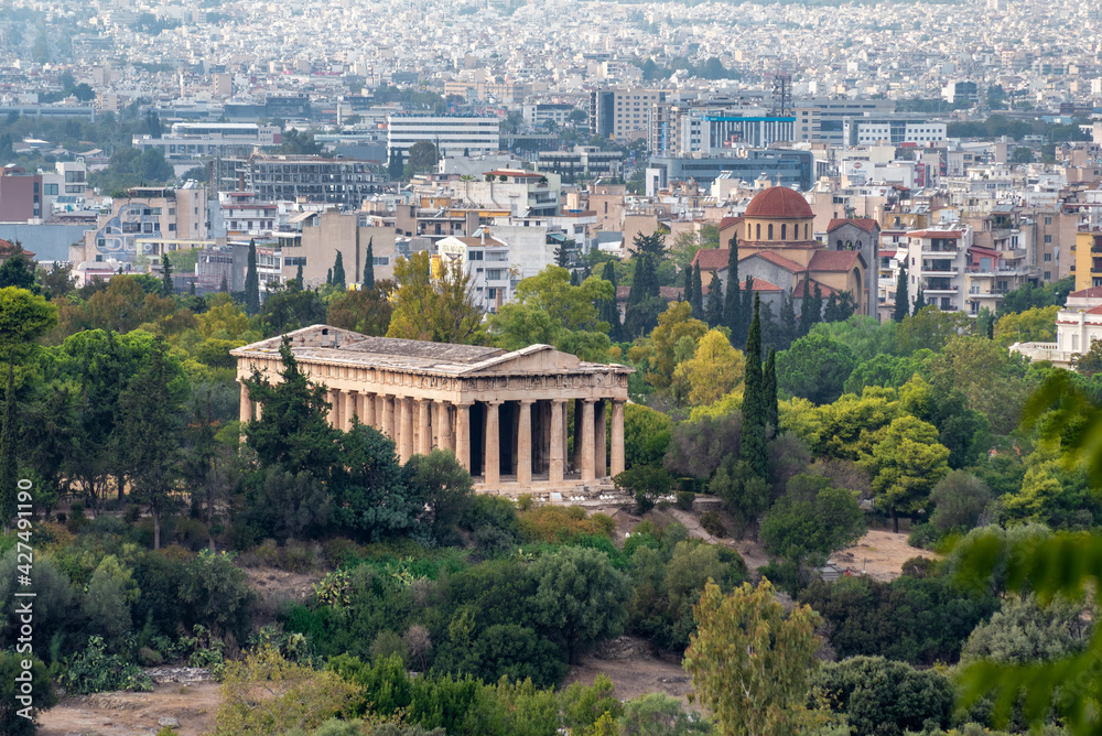 Athens, Attica, Greece. The Temple of Hephaestus or Hephaisteion (also Hephesteum) is an ancient greek temple located at the archaeological site of Agora of Athens in Theseion district. Sunny day