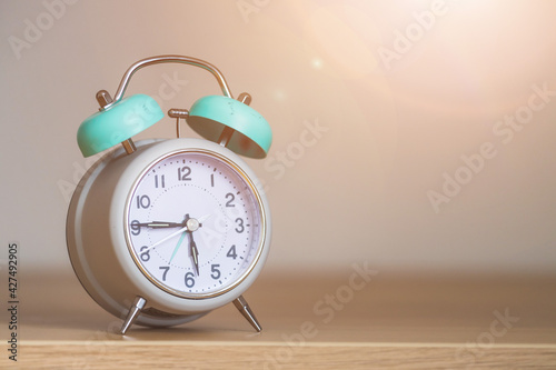 Retro styled white alarm clock, isolated and copy space
