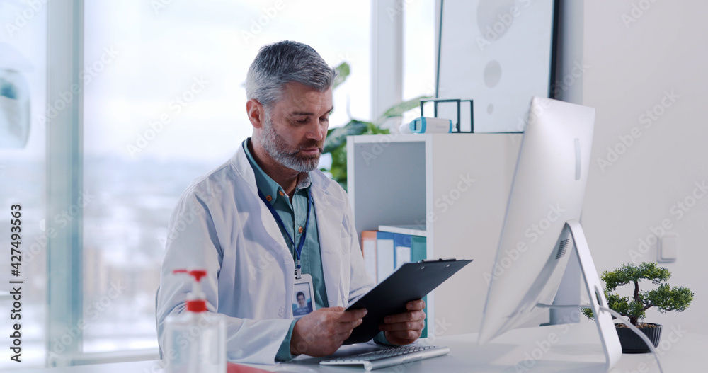 Experienced doctor therapist communicating remotely with online patient customer explaining diagnosis giving advice prescriving medications. Hospital office.