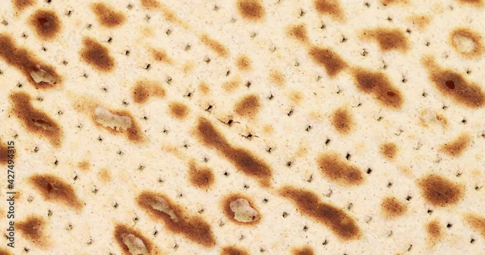 Matzah, unleavened bread rotate. Matzo super slow motion. Matzah, unleavened bread rotate. Matzo super slow motion.