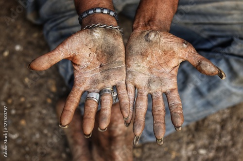 Hands of a beggar who begging money for food. poverty concept 