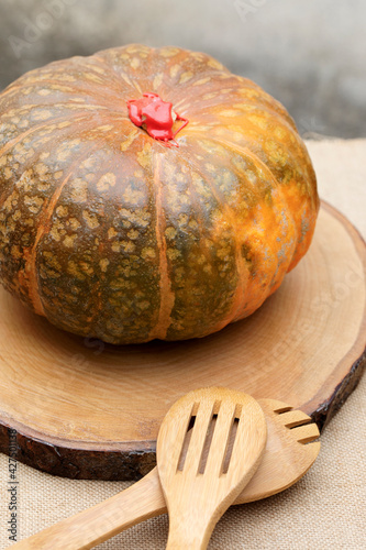pumpkin on a table. wooden set 