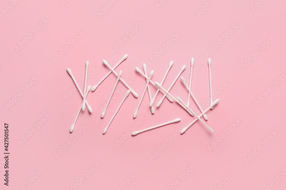 Cotton swabs on color background Cotton swabs on color background