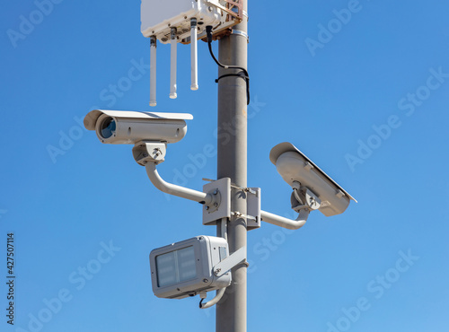 High resolution security cameras, blue sky background, copy space.
