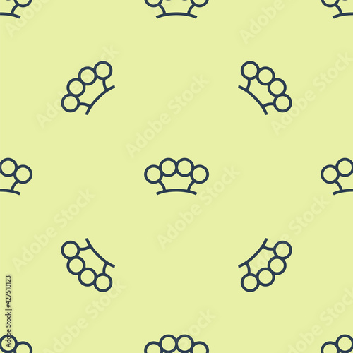 Blue Brass knuckles icon isolated seamless pattern on yellow background. Vector